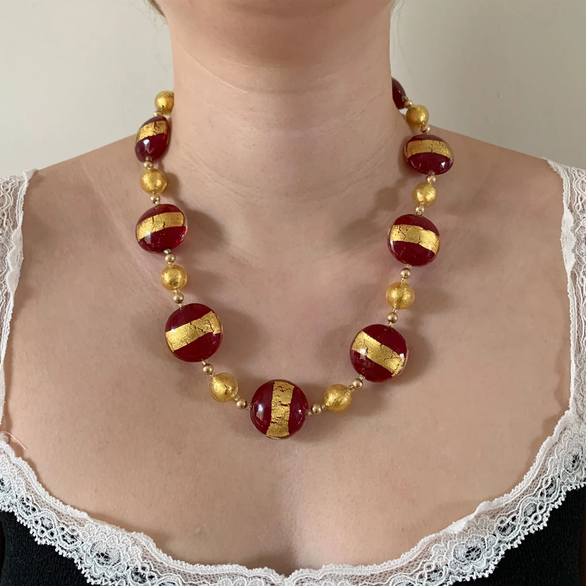 Necklace with red translucent and gold lentil and gold sphere Murano glass beads on gold